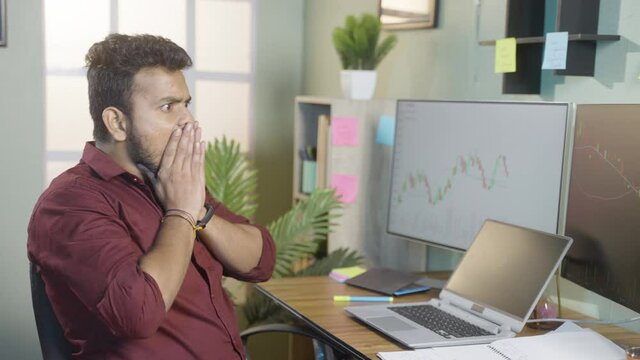 young intraday trader shocked due to sudden market crash while trading - concept of financial loss, risk in share or crypto markets