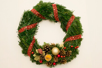 Fototapeta na wymiar Festive background with an Advent wreath. Christmas mood. Handmade decoration.