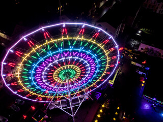 Ferris wheel glows in the dark. top view of the ferris wheel