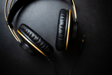 Professional headphones in flat lay. Dj headset shot directly from above. Listen to the music in...