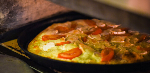 close up view of the italian home made pizza dish