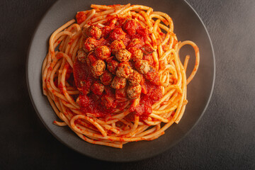 Close up top view plate SPAGHETTI MEATBALLS like an Italian