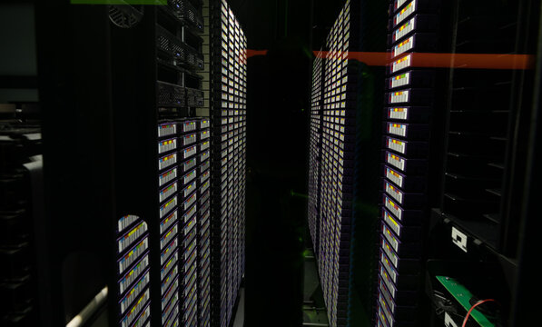 Data center with multiple rows of fully operational server racks