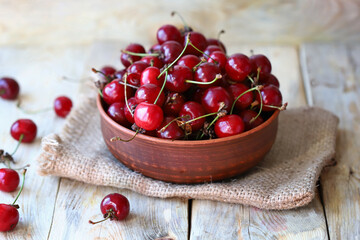 Fresh ripe cherries in a bowl.