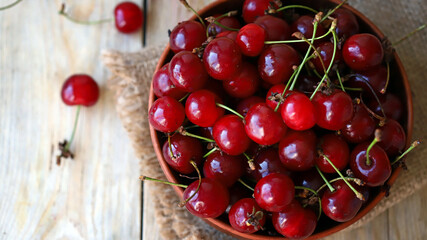 Fresh ripe cherries in a bowl.