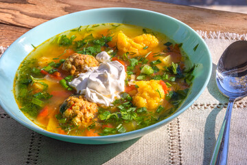 Soup with meatballs and cauliflower. Vegetable soup with meatballs and sour cream. Topic - healthy food