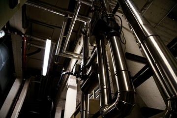 industrial pipes in a basement room