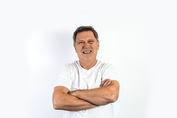 handsome man i white shirt with crossed arms