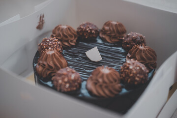 Delicious chocolate cake in box
