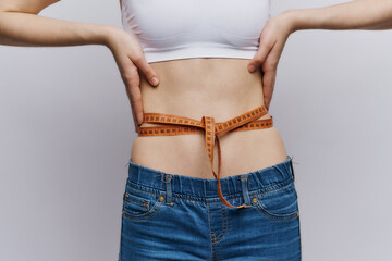 woman measure waist slim figure diet lifestyle