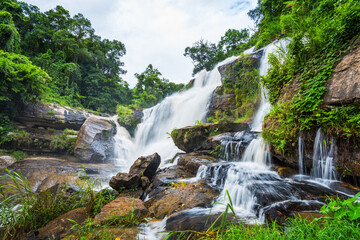 Fototapeta premium Landscape of peaceful waterfall in the tropical rainforest