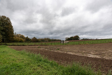 Harvested soil and agriculture land on the Flemish countryside