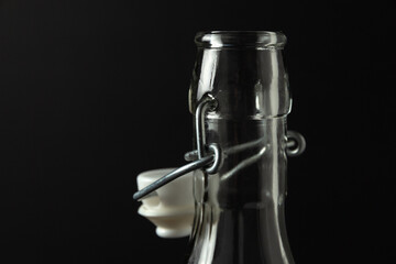 Wire vintage stopper on a glass bottle