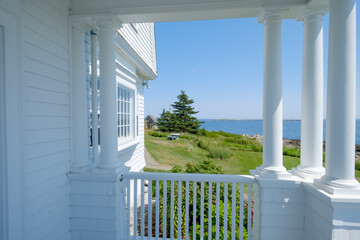 beautiful porch and columns of the Marshall Point Lighthouse keepers quarters