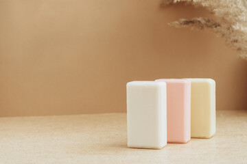Bars of soap made from natural raw materials beige background. Organic cosmetics Spa health concept natural cosmetics