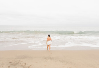 Young woman on a beautiful beach.