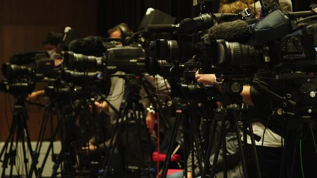 Large number of press and media reporter in broadcasting event. Paparazzi, News and sports at work