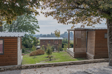 Fototapeta na wymiar Wooden cabins overlooking a vineyard