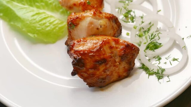 Chicken barbecue shish kebab for dinner. Nice grilled meat food rotating