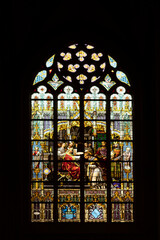Stained glass in the interior of a Dutch  church depicting a religious scene