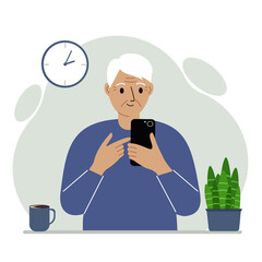 Grandpa holds a mobile phone in his hand. Elderly man learning to use the telephone.