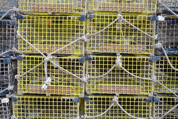 Nylon coated newer lobster traps ready for boarding onto lobster boats