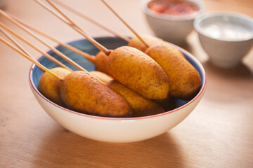 Corn dogs cooked with sausage and dough - obrazy, fototapety, plakaty