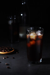 Cold coffee with ice in low key