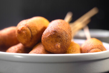 Corn dogs cooked with sausage and dough - obrazy, fototapety, plakaty