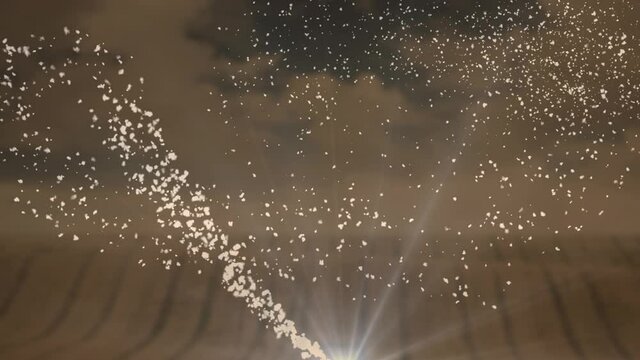 Animation of shooting star and snow falling over countryside fields on brown background