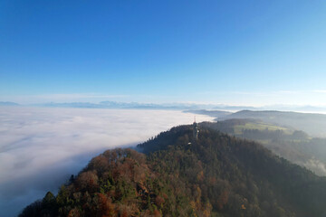 Aerial perspective of autumn landscape with sea of fog at region of Uetliberg Albis at Canton Z&uuml;rich on a beautiful sunny day. Photo taken November 12th, 2021, Zurich, Switzerland.