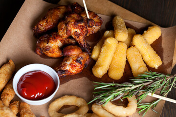 baked chicken wings together with ketchup