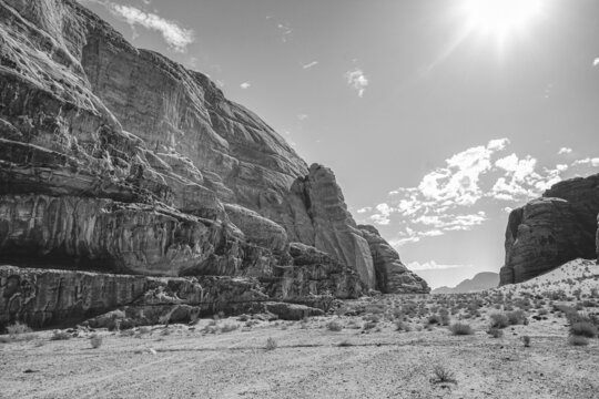 black and white photo of the Wadi Rum desert with beautiful weathered relief mountains, Jordan
