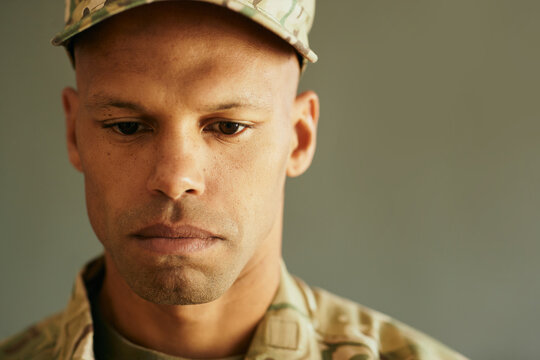 Close-up Portrait Of Distraught Military Officer.