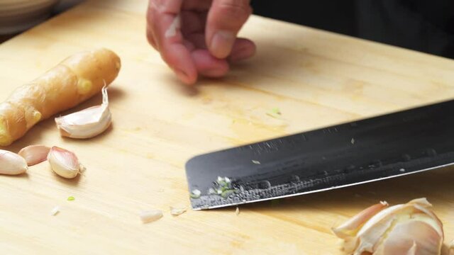 Hand-cut Chinese traditional saut&eacute;ed scallion ginger minced garlic