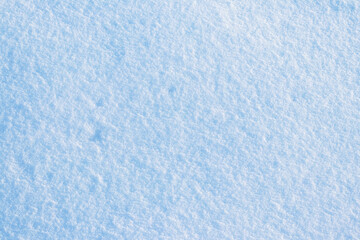 Obraz premium Uniform snow cover. Snow texture on a flat plot of land