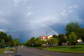 Summer rainbow in neighborhood 