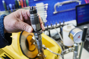 At the stand, the process of checking the operability and wear, the operational properties of the...