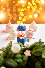 Merry Christmas card. Variety of sweet delicious cakes. Fir branches on a gray background. Merry Christmas card. New year mood