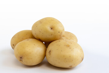 pile of potatoes isolated on white background
