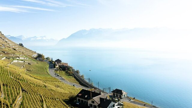 Les vignes de lavaux vues du ciel. Vue a&eacute;rienne en drone de bourg-en-lavaux et du lac l&eacute;man en 4k. 