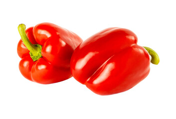Two red bell peppers isolated on a white background.
