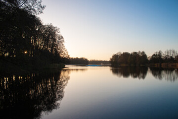 Fototapeta na wymiar Lake in Klodawa Poland at sunset in autumn