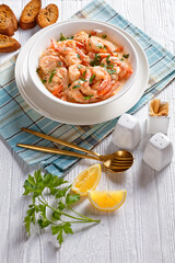 prawns cooked in rich, creamy Alfredo sauce