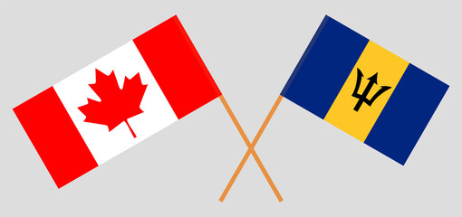 Crossed flags of Canada and Barbados. Official colors. Correct proportion
