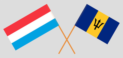 Crossed flags of Luxembourg and Barbados. Official colors. Correct proportion