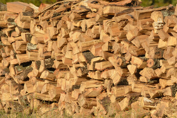 Prime hardwood firewood stacked in a pile