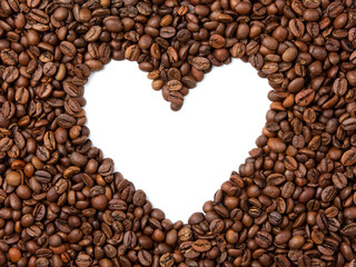 Texture of roasted coffee beans on white isolated background. In the center is the shape of the heart.