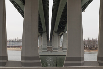 Fototapeta premium Bridge over the river bottom view