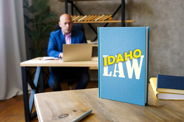 Book with title LAW IDAHO . Idaho residents are subject to Idaho state and U.S. federal laws